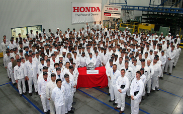 HPPG first shift associates assemble around HPPG's one millionth automatic transmission produced today.