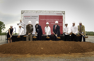 TALLAPOOSA, Ga. -  Honda executives and Georgia officials break ground at the site of the new Honda Precision Parts of Georgia, LLC (HPPG) transmission manufacturing facility in Tallapoosa, Georgia.  The $100 million facility is scheduled to begin production in spring of 2006.  Initially, the facility will support production of Honda Odyssey minivans and Pilot SUVs at Honda Manufacturing of Alabama, LLC (HMA) in Lincoln, Alabama.  The 250,000-square-foot Georgia facility will be HondaÕs 13th major plant in North America. From left: Joan Young, Executive Director, Haralson County Development Authority, Gen Tsujii, Senior Vice President, Honda of America Manufacturing, Micajah Bagwell, Mayor, City of Tallapoosa, Allan Poole, Chairman, Haralson County Commission, Nobu Sanui, President, HPPG, Sonny Perdue, Governor of Georgia, Akio Hamada, President and CEO, Honda of America Manufacturing, John Spoltman, Vice President, HPPG, Philip Eidson, City Manager, Tallapoosa.
